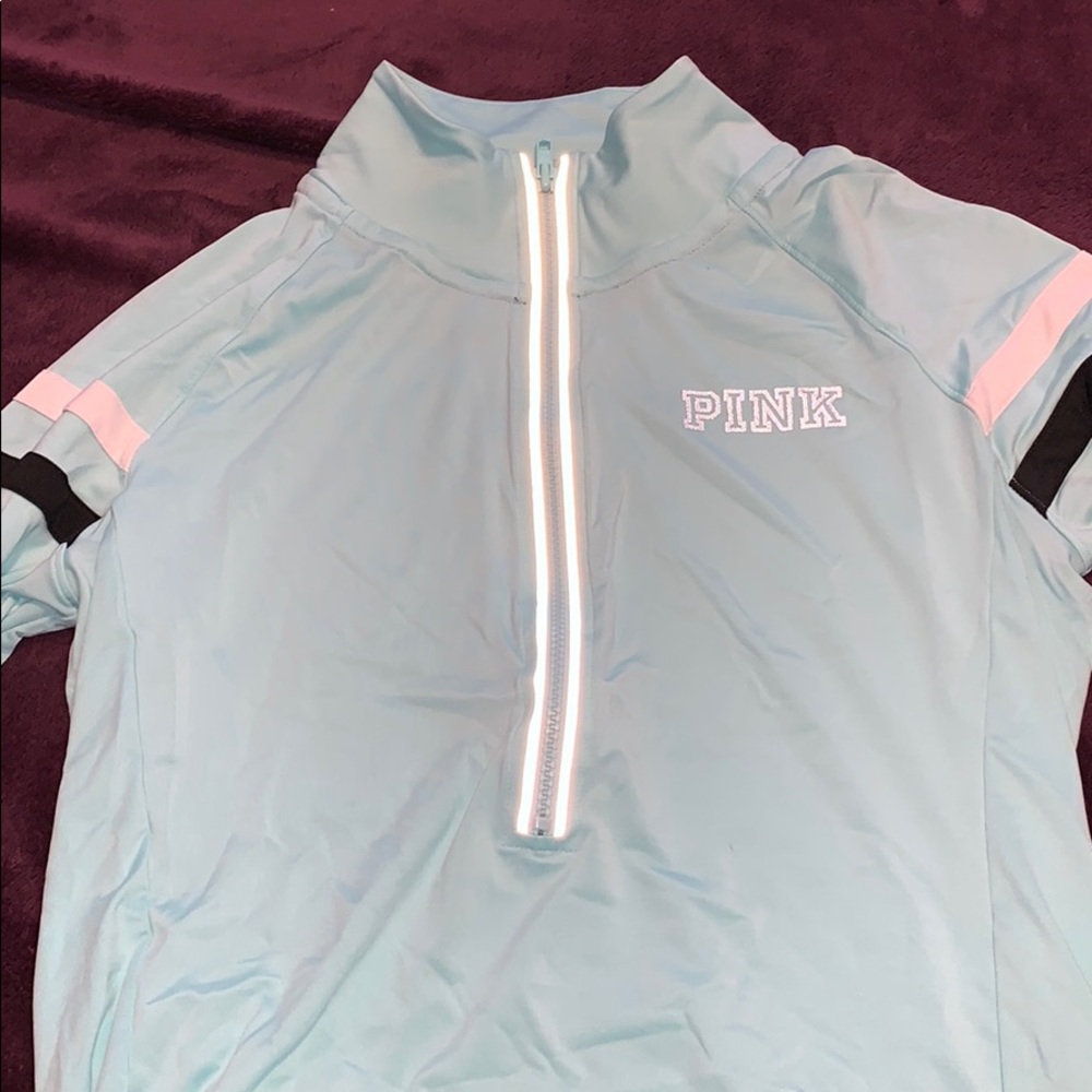 Pink quarter zip nylon running shirt